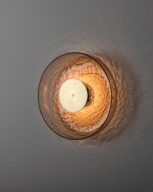 Medium Crackle Glass Wall Light Greenway tea coloured glass brass centre on a grey wall  