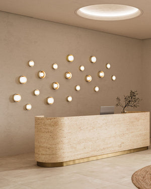 Large Framed Orb Wall Light Styled in a Cluster at a Reception Desk