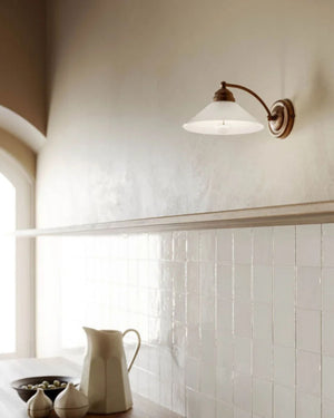 Italian Brass & Glass Wall Light in a kitchen 