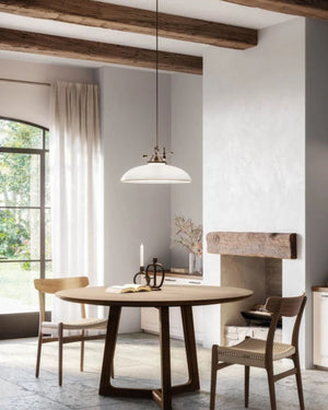Italian Country Pendant in a rustic living room hanging over a wooden round table