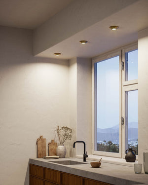 Miniature Ceramic and Brass Ceiling Lights in a modern kitchen over the sink
