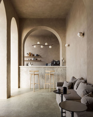 Refined Textured Glass Wall Lights in a modern grey living room over a sofa