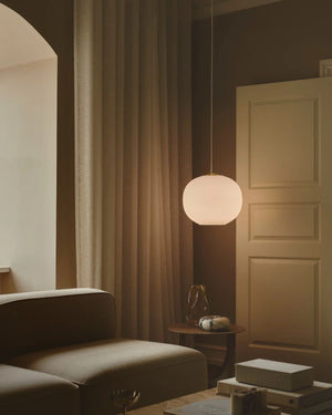 Spherical Opal Glass and Brass Pendant In Warm Styled Interior - Lighting Collective 