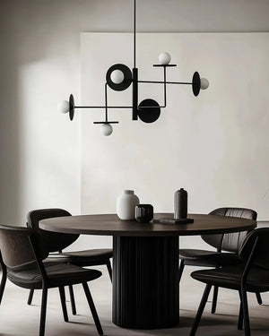 Dining room with a modern Minimalist Orb Disc Chandelier