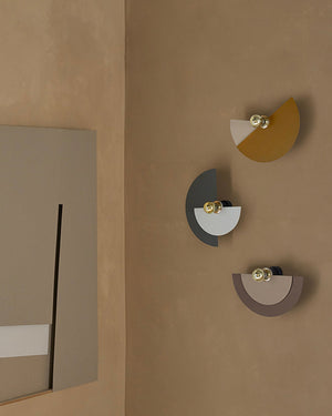Playful Half-Moon Steel Wall Light