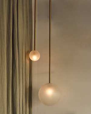 Minimalist sphere Pendant on beige backgorund