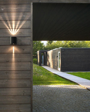 Modern LED Wall Light Styled on a Wood Wall | Lighting Collective