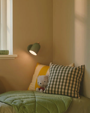 Pastel Nordic Adjustable Wall Light finished in Green featured in a children's room - Lighting Collective  