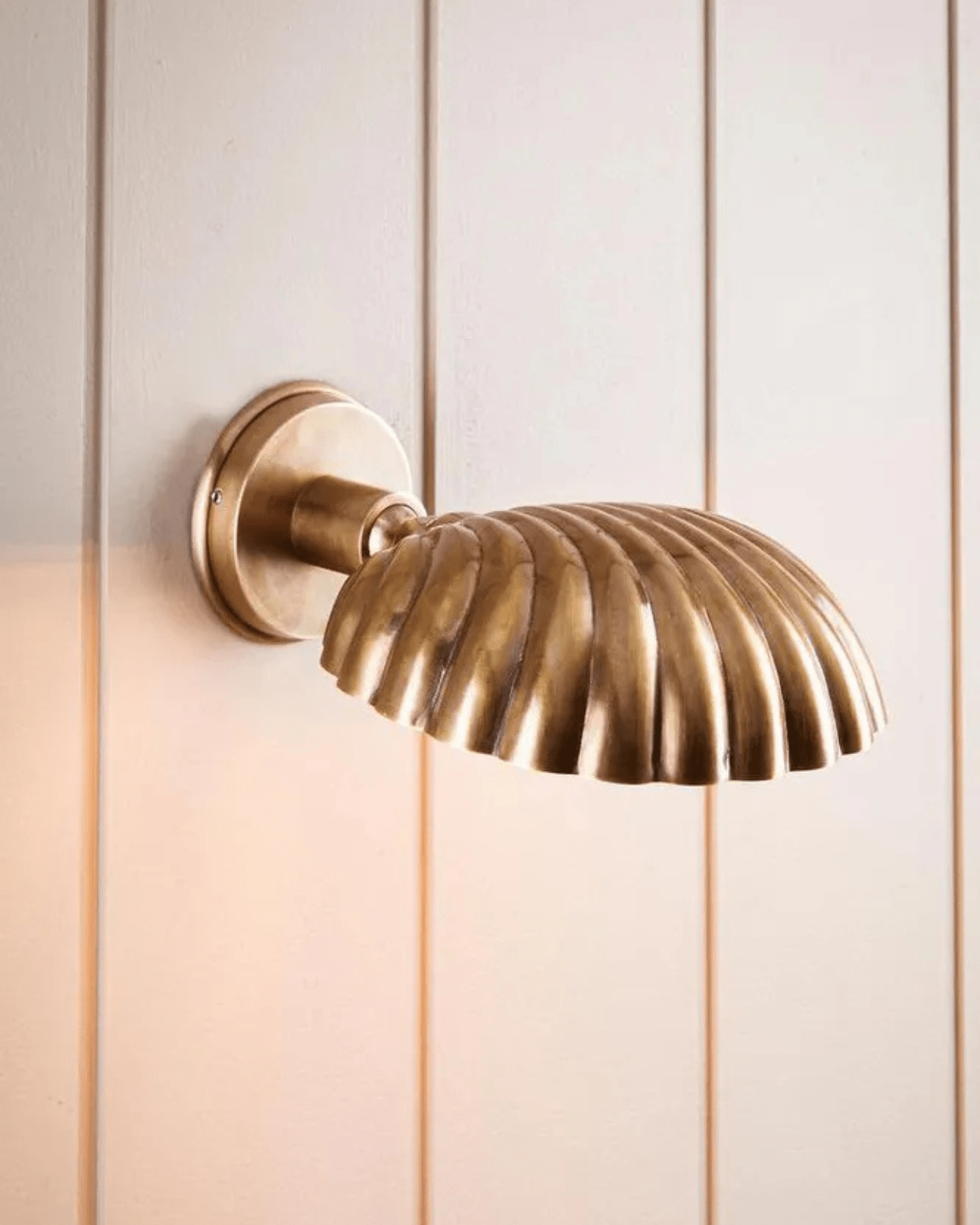 Rotatable Antique Brass Shell Wall Light | Lighting Collective