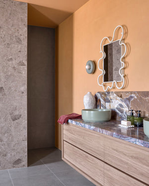 Rounded Disc Concrete Wall Light in Eclectic Style Bathroom