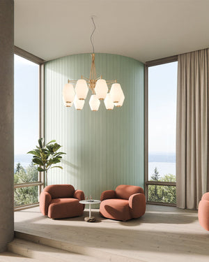 A large Scandinavian geometric glass chandelier hanging above a contemporary style dining space