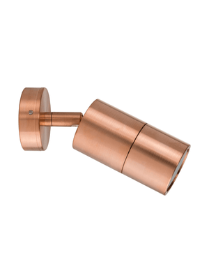Copper wall light fixture on a white background