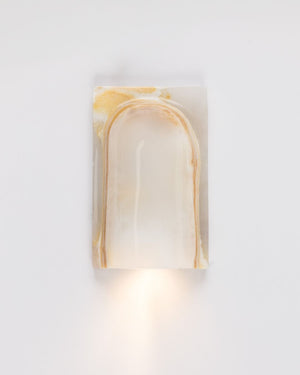 Wall-mounted light fixture with a marble arch design on a white background