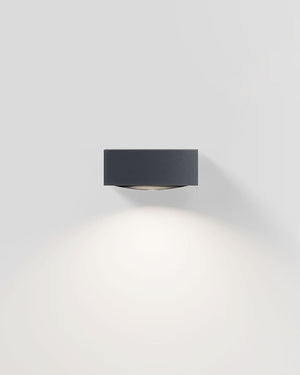 Square down outdoor wall light in anthracite showing downward LED wash on white background