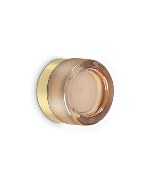 Thick Sandblasted Glass Wall Light in brass finish with amber glass diffuser on white background