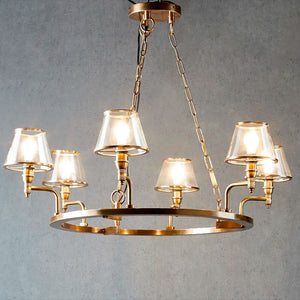 Classic Ring Brass Chandelier on a grey background light on