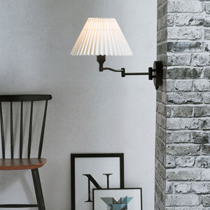 Classic Swing Arm Wall Light in a living room