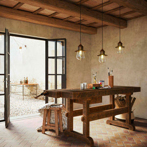 Contemporary Teardrop Pendant Light grouped above a painting table in a farmhouse