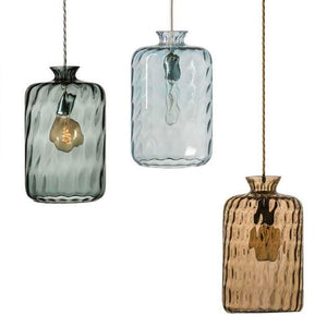 dimples glass pendant light cluster of three pendants with golden smoke topaz bleu and smokey grey finishes