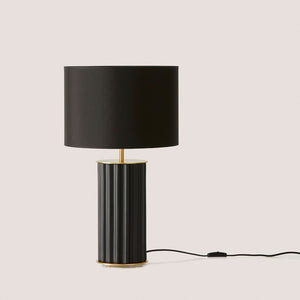 modern ridged ceramic table lamp with matt brass finish, matte black base and black fabric shade