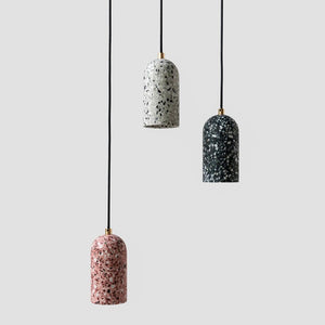 modern terrazzo bell pendant by bentu with white black and red finishes and different heights