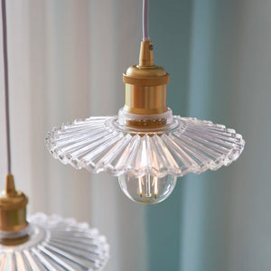 vintage ribbed glass plate pendant close up on the shade