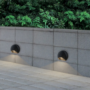 Contemporary Anthracite Wall Down Light side view with anthracite finish in an entrance way