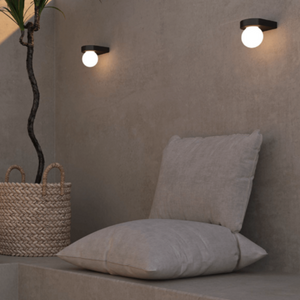 Outdoor Hung Orb Wall Light in a patio 