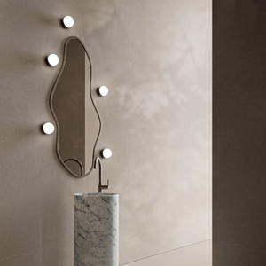 Elegant Miniature Orb Wall Light displayed around a mirror in a bathroom